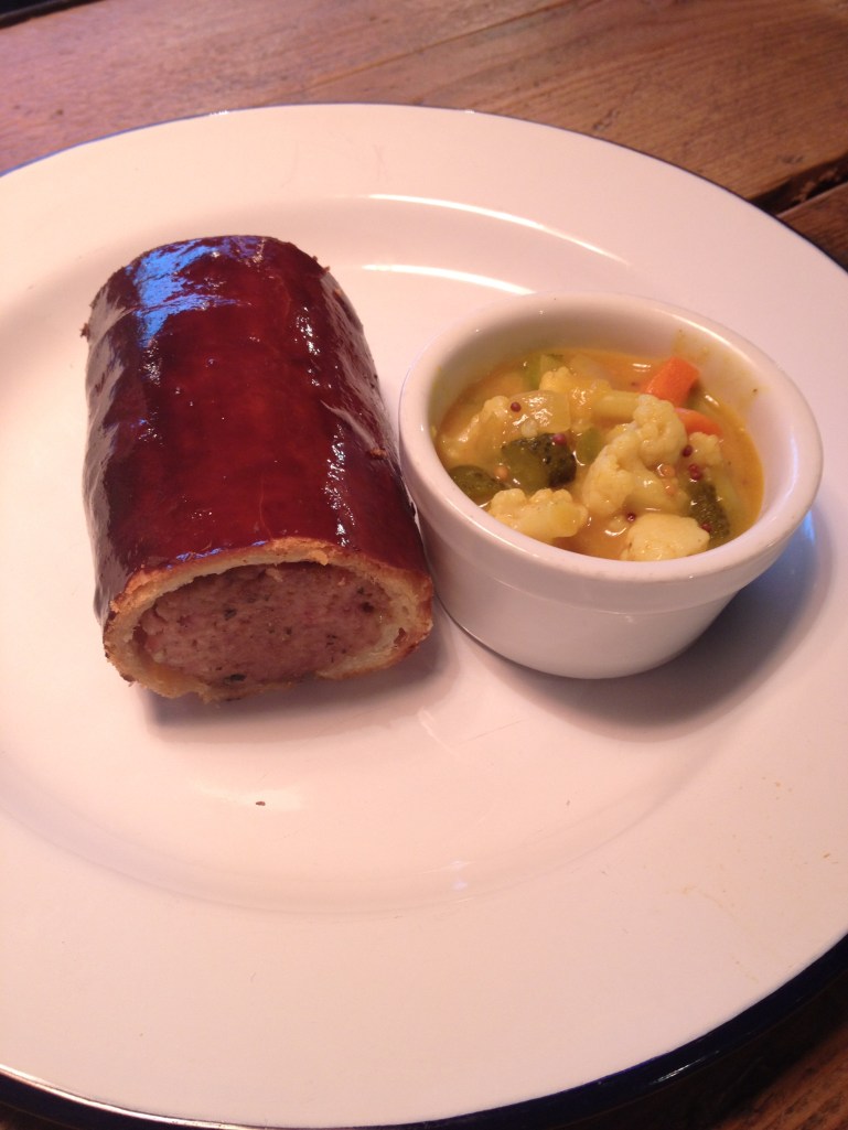 HOMEMADE SAUSAGE ROLL WITH PICCALILLI