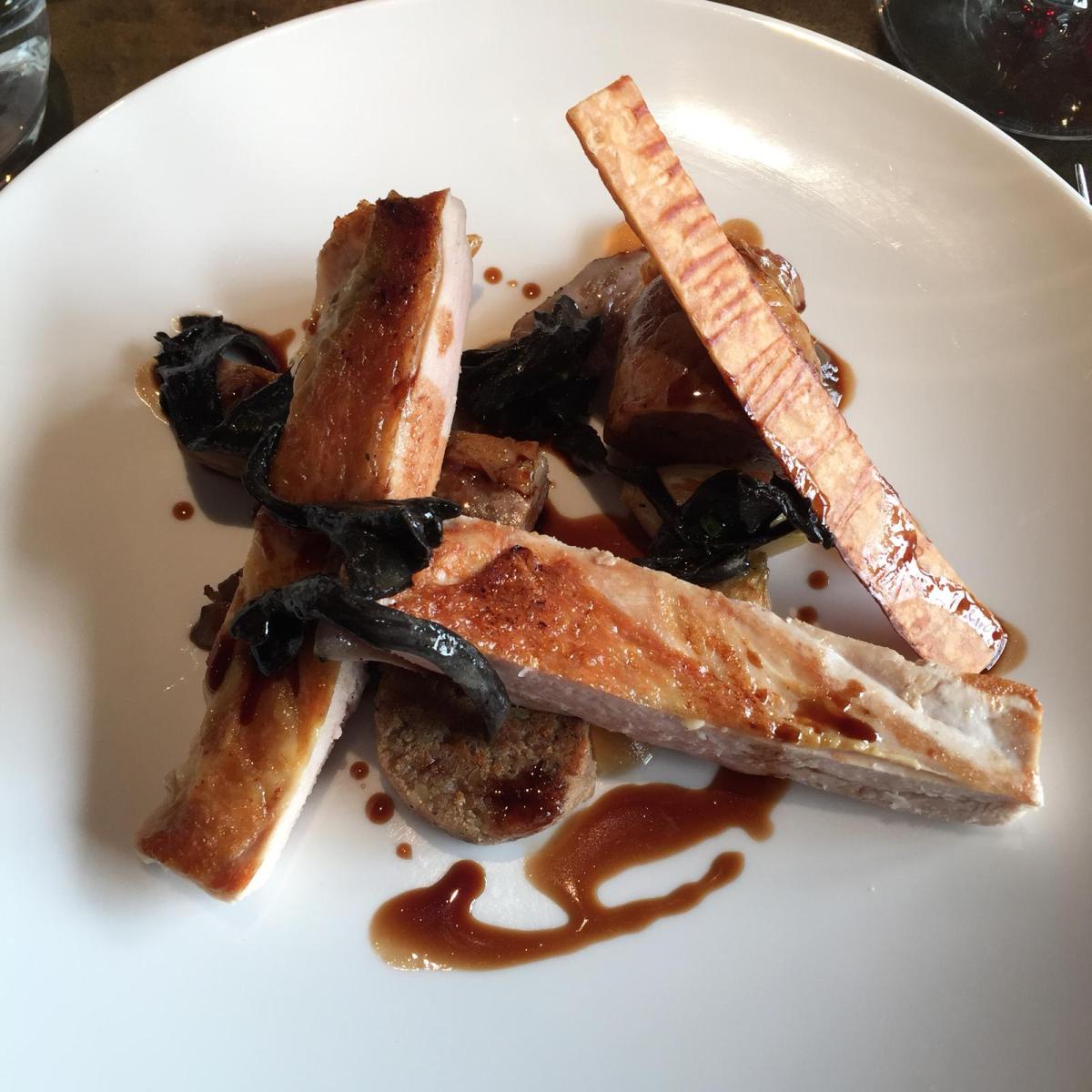 Guinea fowl pan roasted breast &amp; braised leg with trompette mushrooms, white pudding and chestnut mushroom purée